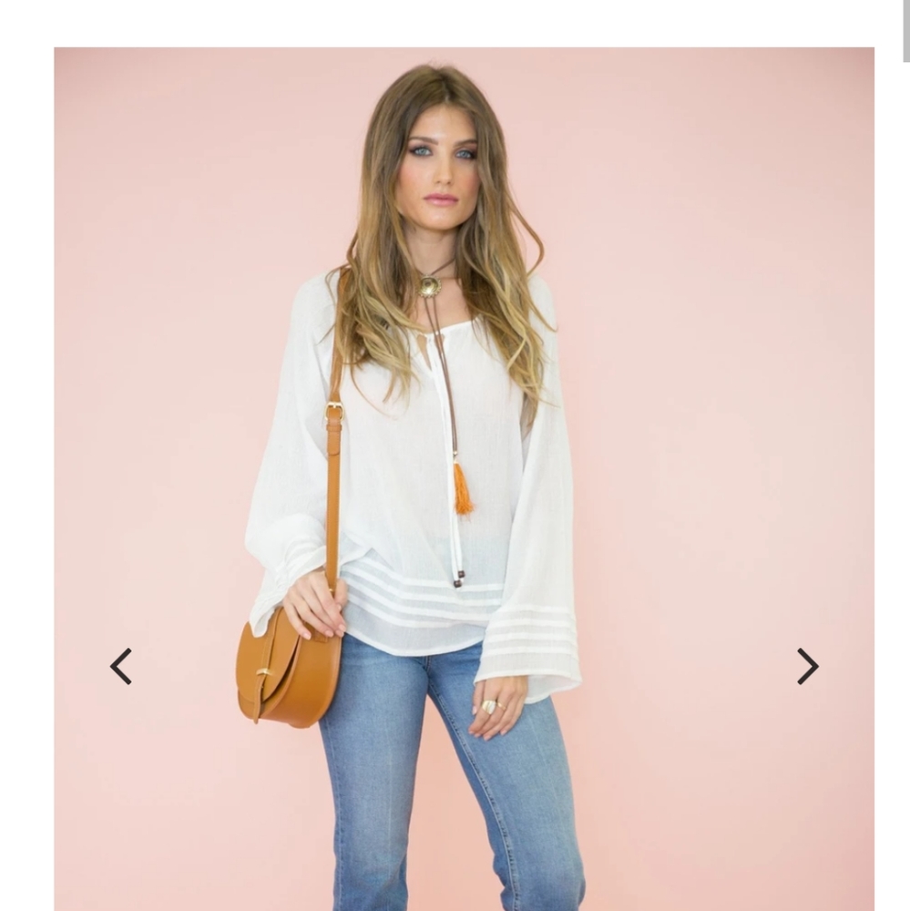 White linen type gauzy top (100% Rayon).